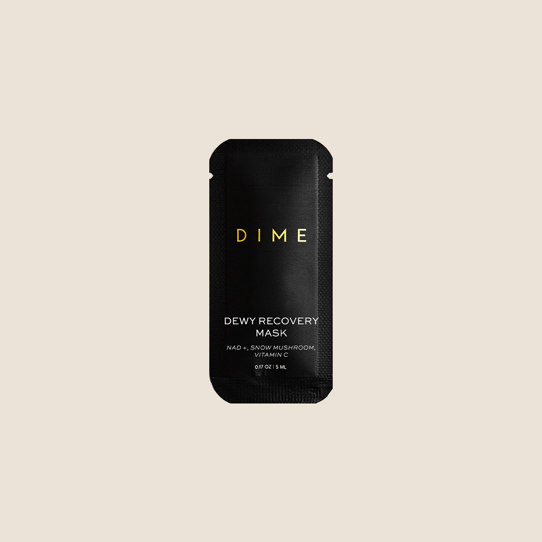 Black sachet pouch labeled "DIME Dewy Recovery Mask" with gold text, 0.17 oz sample size.