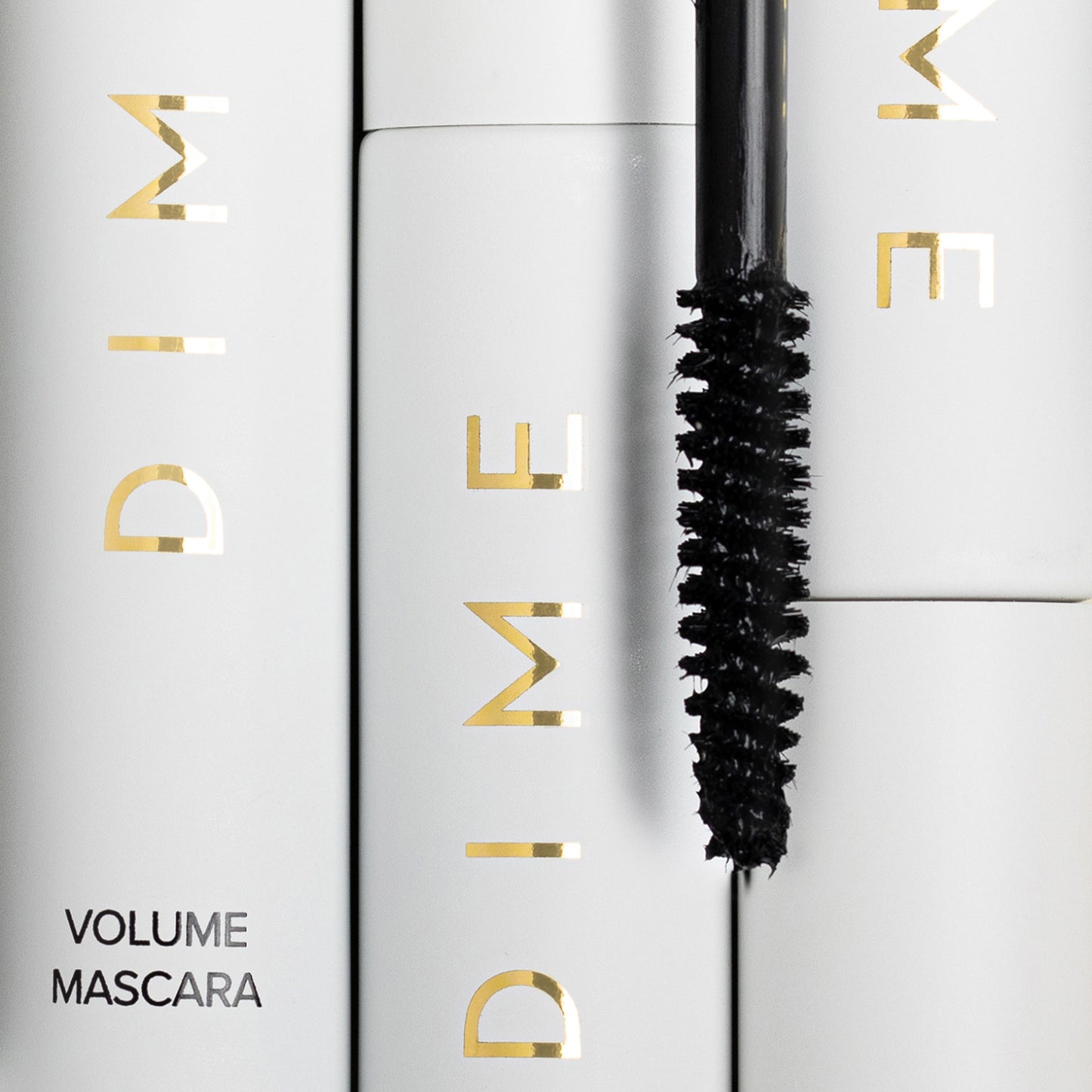 close up of the mascara wand and tube