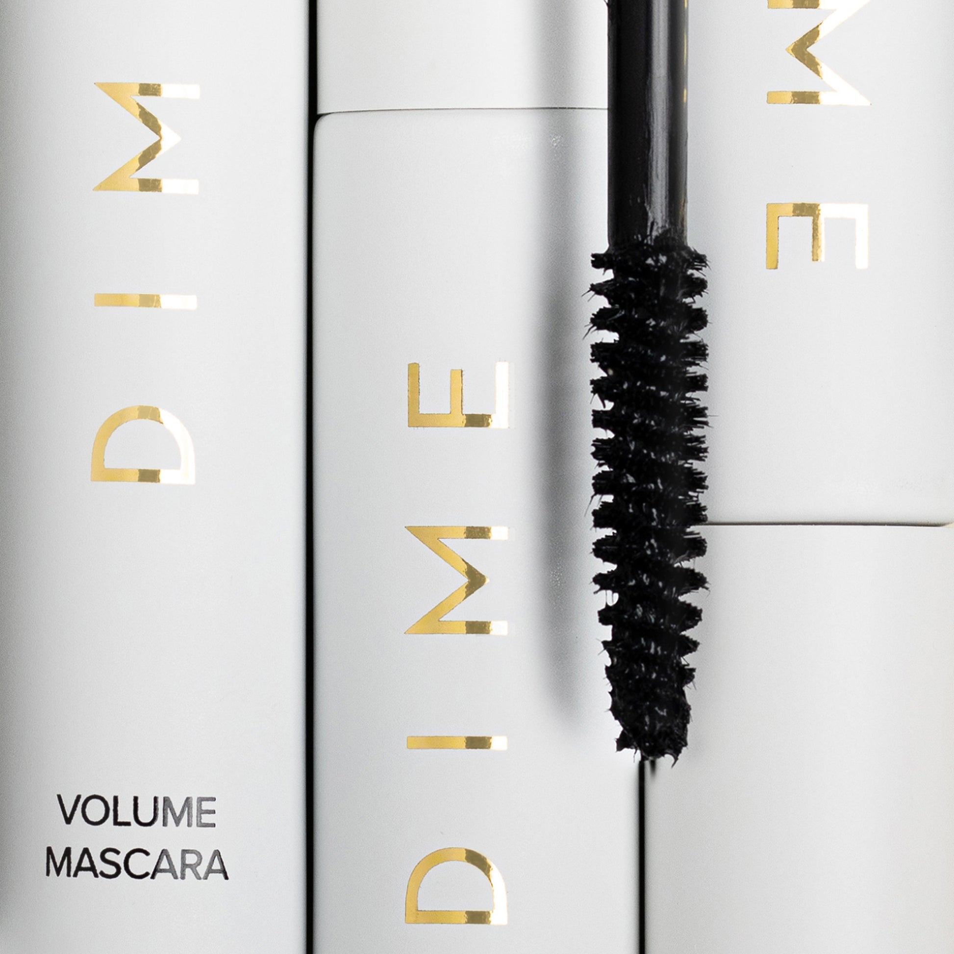 close up of the mascara wand and tube