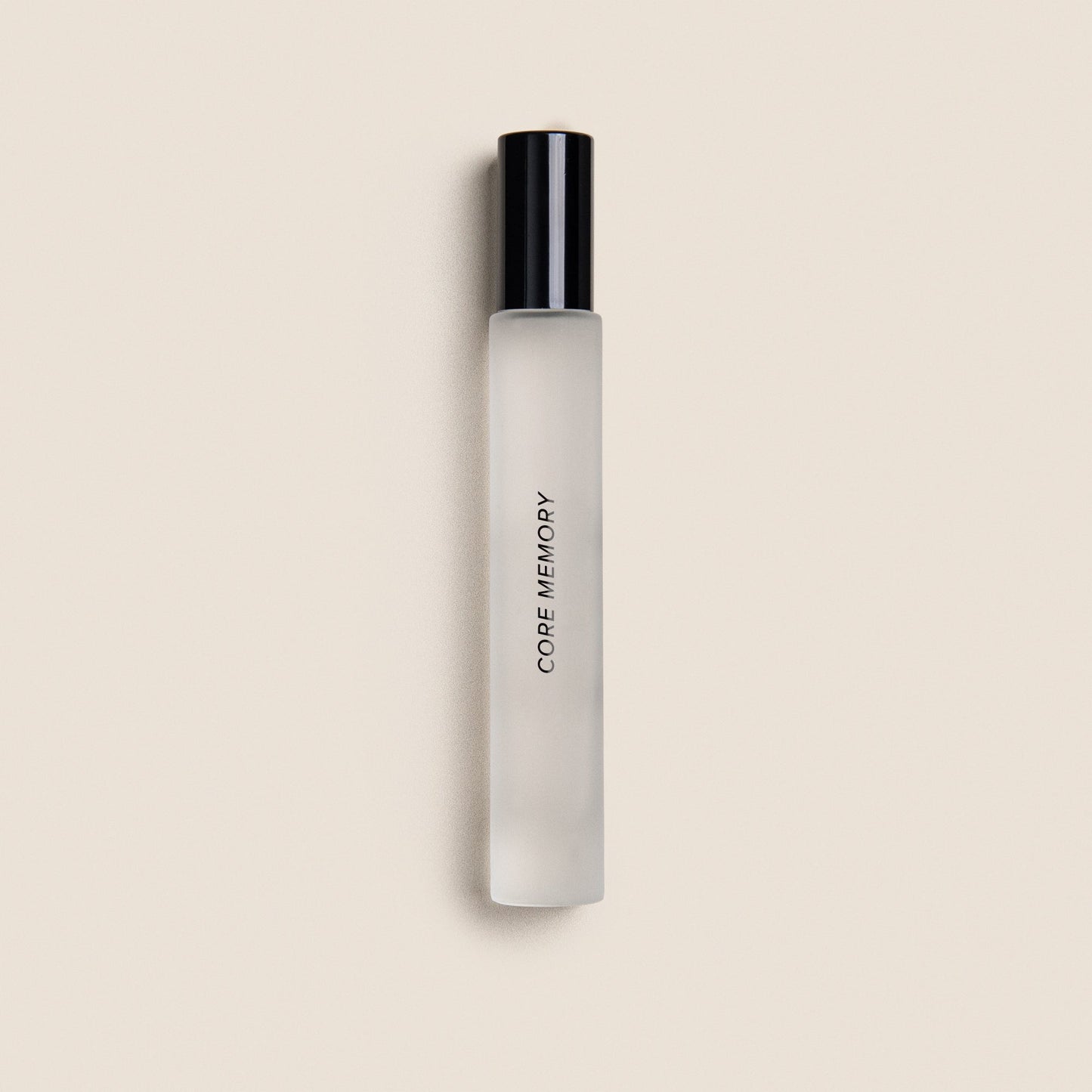 White cylindrical roller with black cap labeled "CORE MEMORY" on beige background.