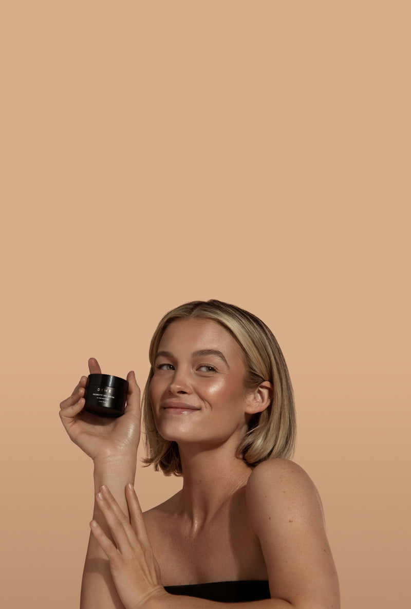  woman holding product